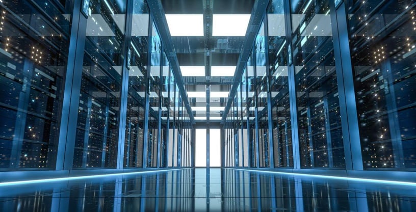 Hallway in a data center with servers lining the walls